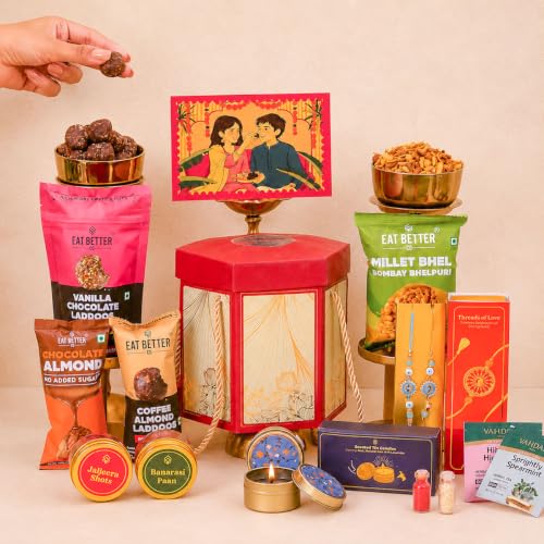 Pyaar Ka Pitara 14-Item Rakhi Gift Hamper for Brother and Bhabhi - Bhaiya Bhabhi Rakhi Set, Evil Eye & Lumba Rakhi, Roli-Chawal, Dry-Fruit Laddoos, Choco-Nuts, Candles, Mukhwas, Tea & more