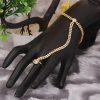 Vama Fashions Gold Plated Hand